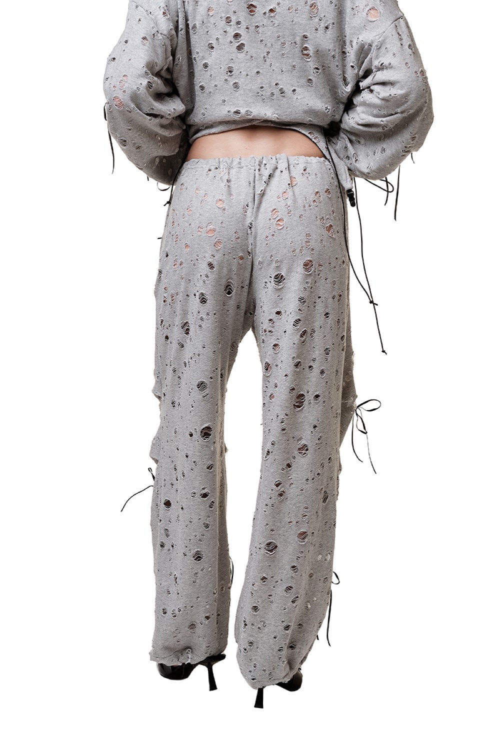 Sweatpants hole punch - photo 50465