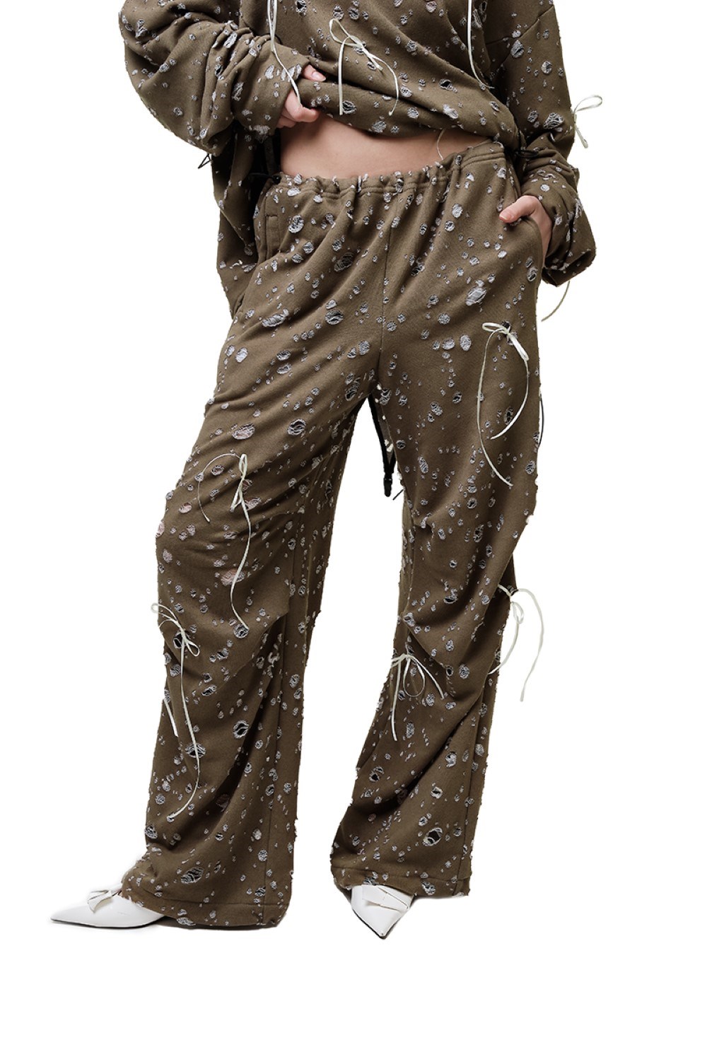 Sweatpants hole punch - photo 50470