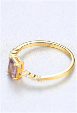 Rainbow ring with purple crystal