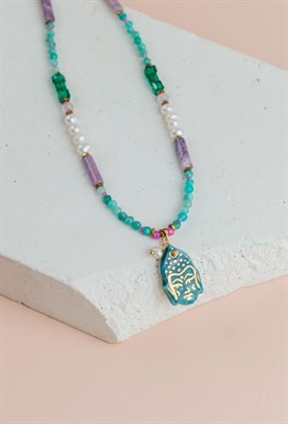 Porcelain Buddha on necklace
